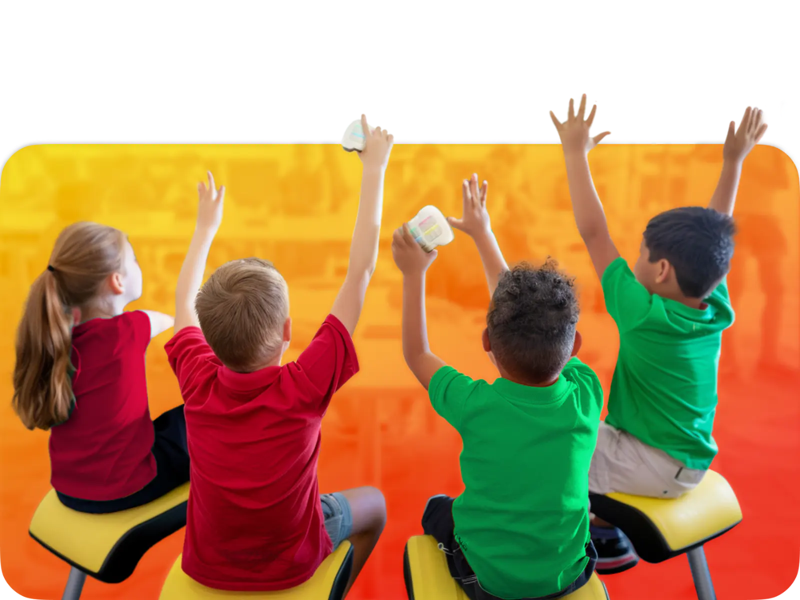 Children in colorful shirts enthusiastically raising their hands in a classroom, illustrating engagement and excitement.