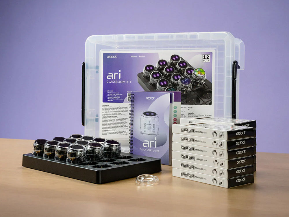 Ari Classroom Kit by aedt with experiment containers, instruction manual, and additional supplies on a table.