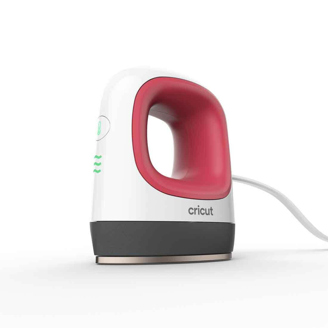 Cricut EasyPress Mini™ in white and red, perfect for heat transfer on baby shoes, hats, and more.