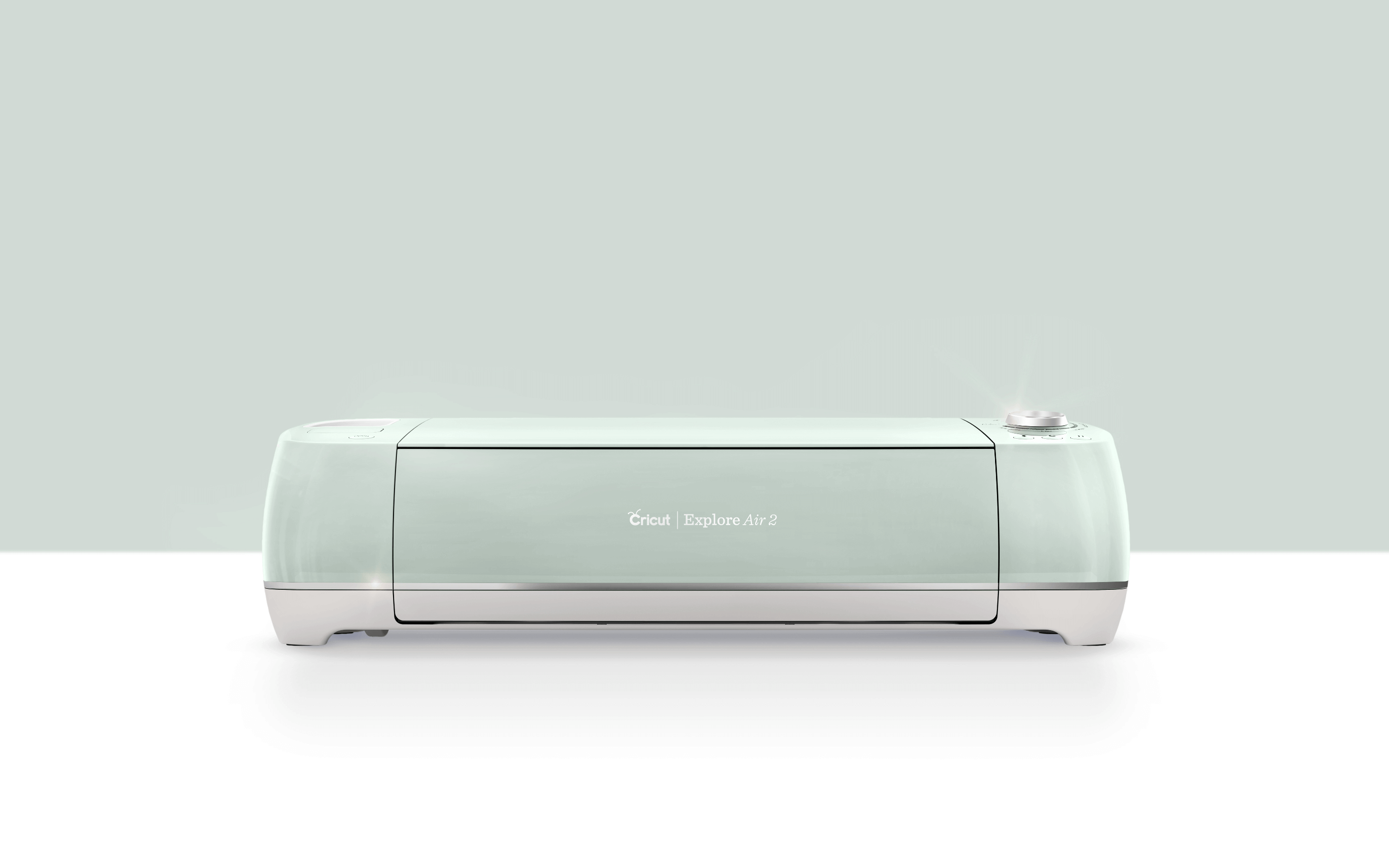 Cricut Explore Air™ 2 in mint color, a fast DIY machine for cutting and writing on various materials.