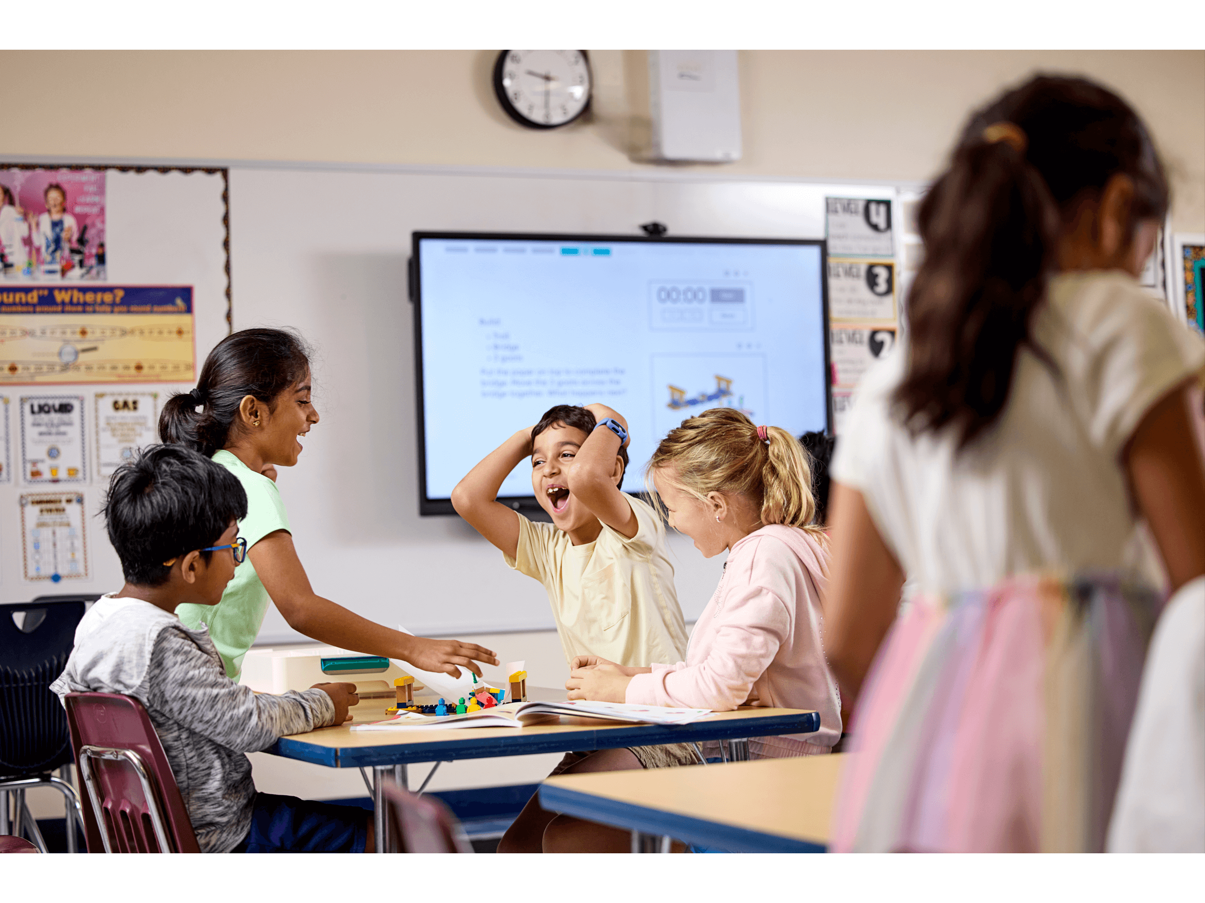 Children engaging with LEGO® Education Science kits in a classroom, fostering collaboration and hands-on learning.
