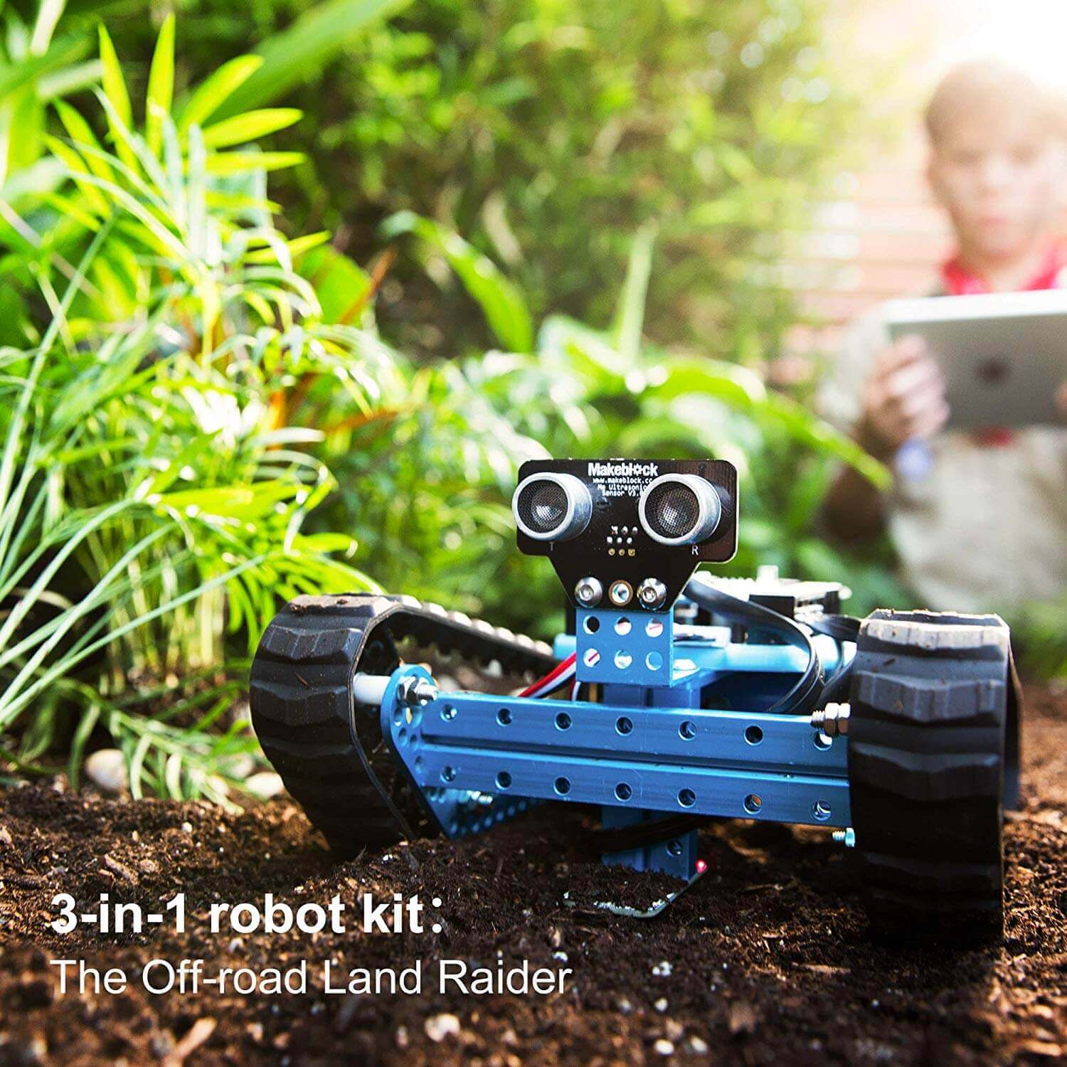 Makeblock mBot Ranger kit in Off-road Land Raider mode, showcasing educational robotics in nature.