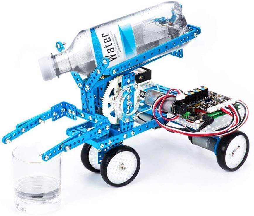 Makeblock Ultimate Robot Kit V2.0 mBot with water bottle and glass, demonstrating robotic arm tank features.
