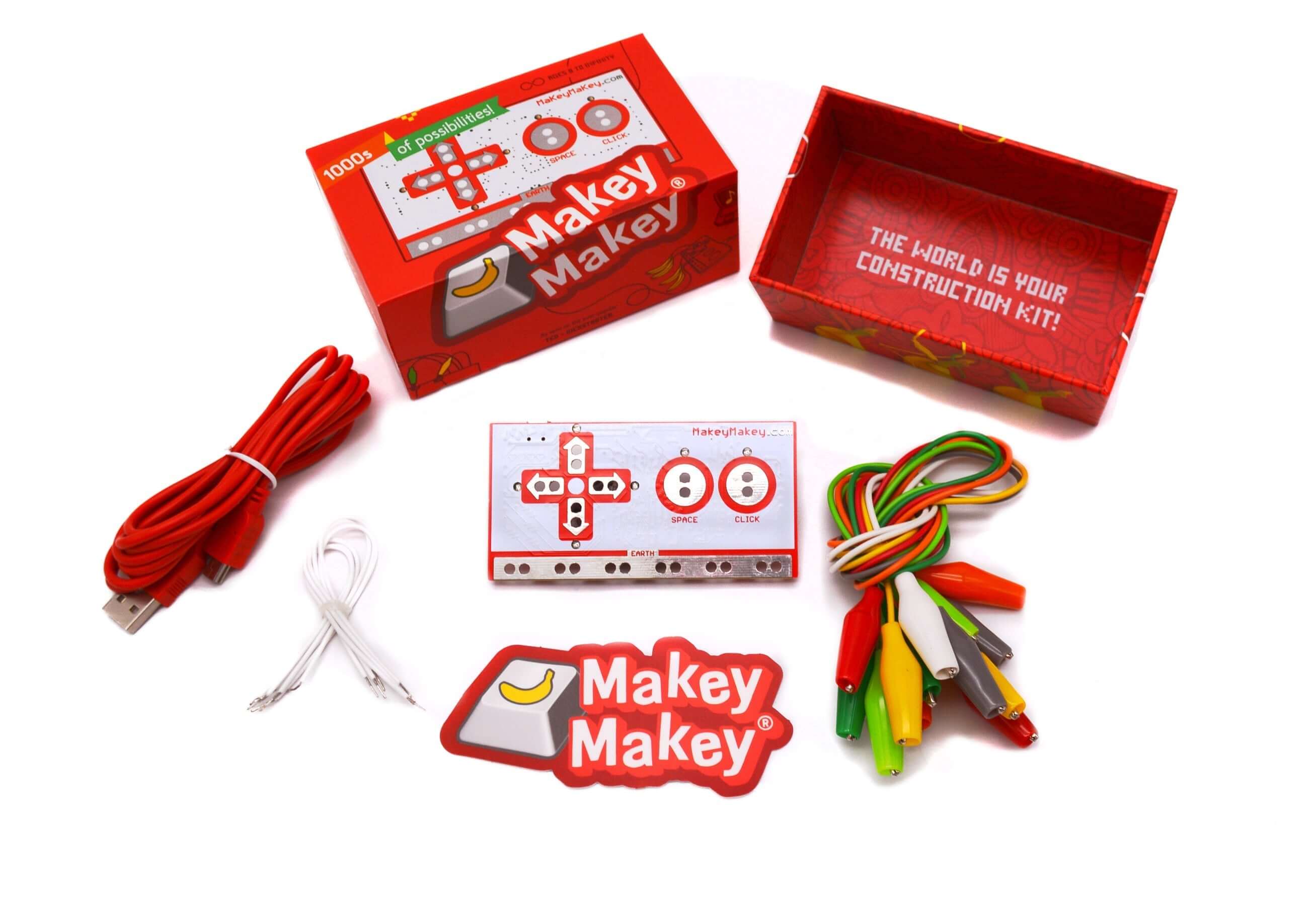 Makey Makey® Classic Kit contents including board, cables, stickers, and box for creative projects.