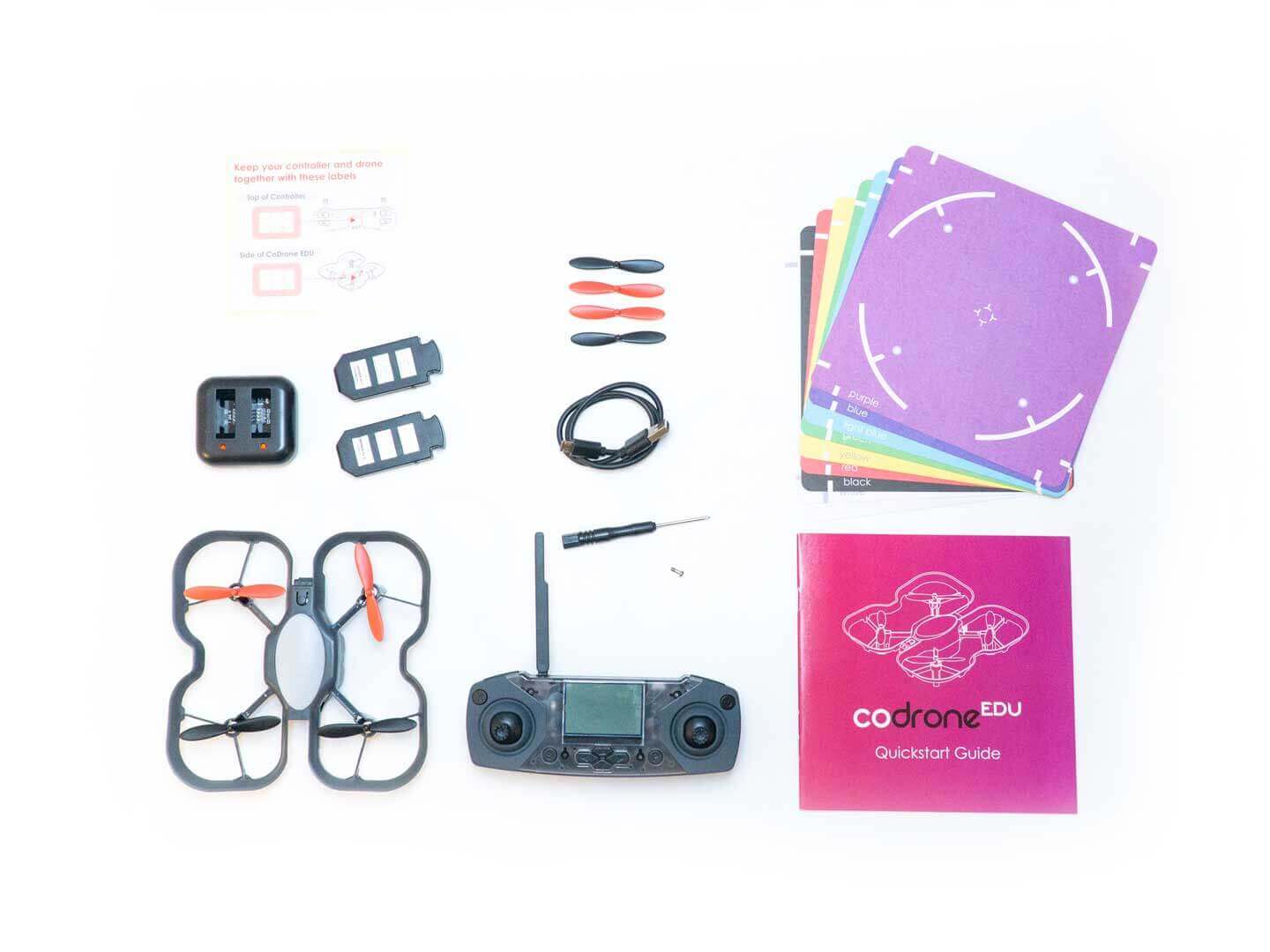 CoDrone EDU classroom kit includes drone, controller, quickstart guide, and accessories for learning coding and engineering.