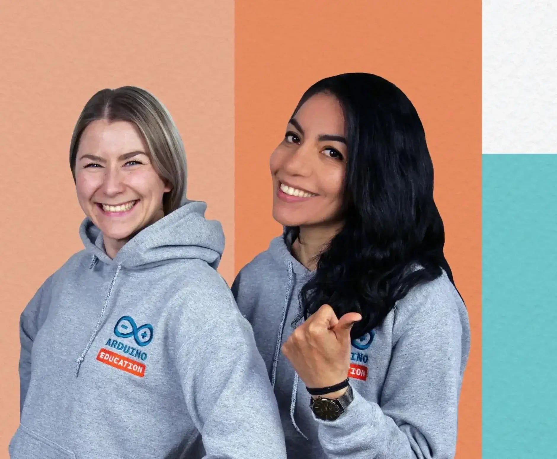 Two women smiling in gray Arduino Education hoodies against a colorful background, promoting STEM learning.