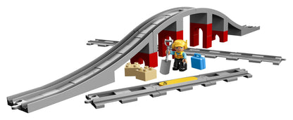 LEGO DUPLO Town Train Bridge and Tracks Set 10872 with curved bridge, tracks, and a mini figure.
