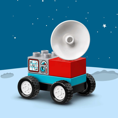 LEGO® DUPLO Town Space Shuttle Mission set vehicle with blue and red bricks, designed for toddler imaginative play.