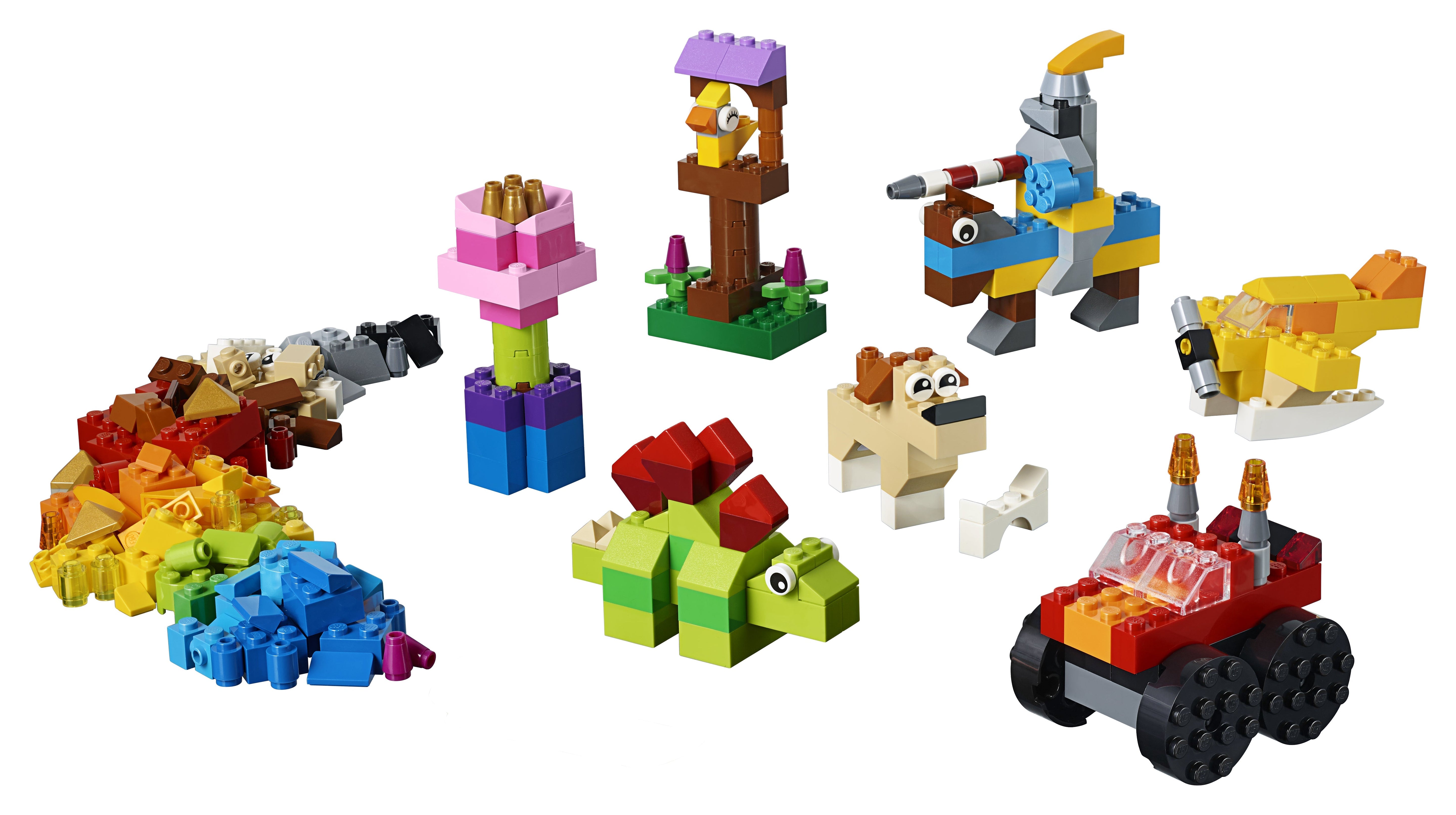 LEGO® Classic Basic Brick Set 11002 featuring colorful animals, flowers, and vehicles made of assorted bricks.