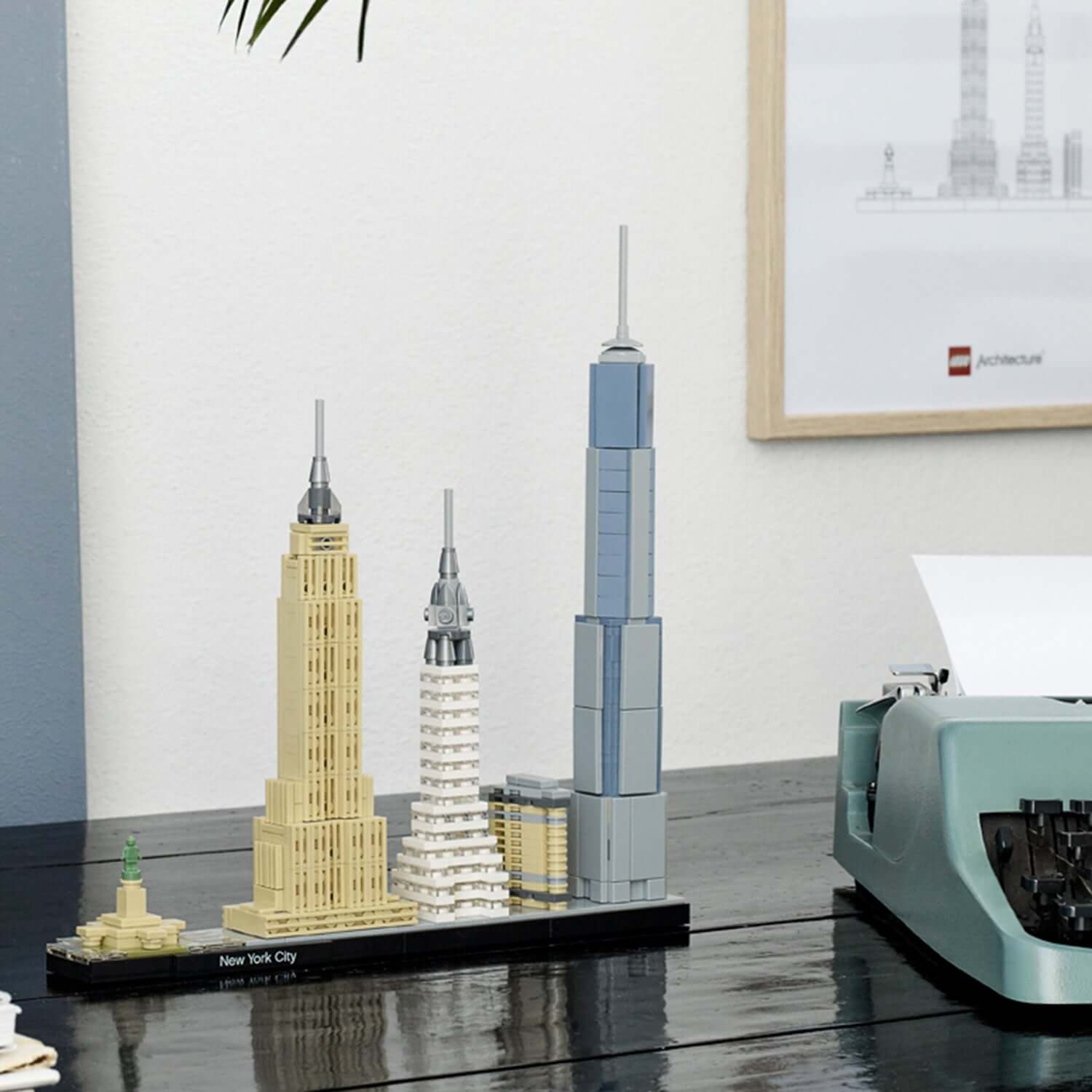 LEGO Architecture New York City skyline set featuring Empire State, Chrysler, One World Trade Center models.