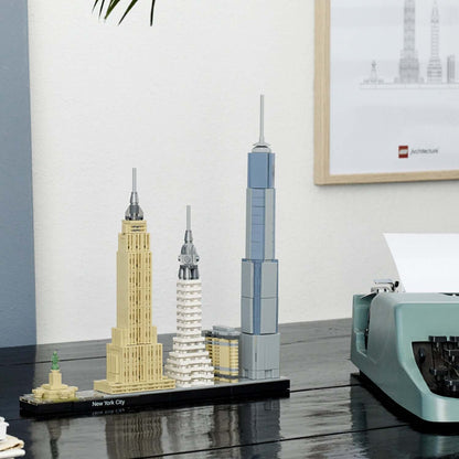 LEGO Architecture New York City skyline set featuring Empire State, Chrysler, One World Trade Center models.