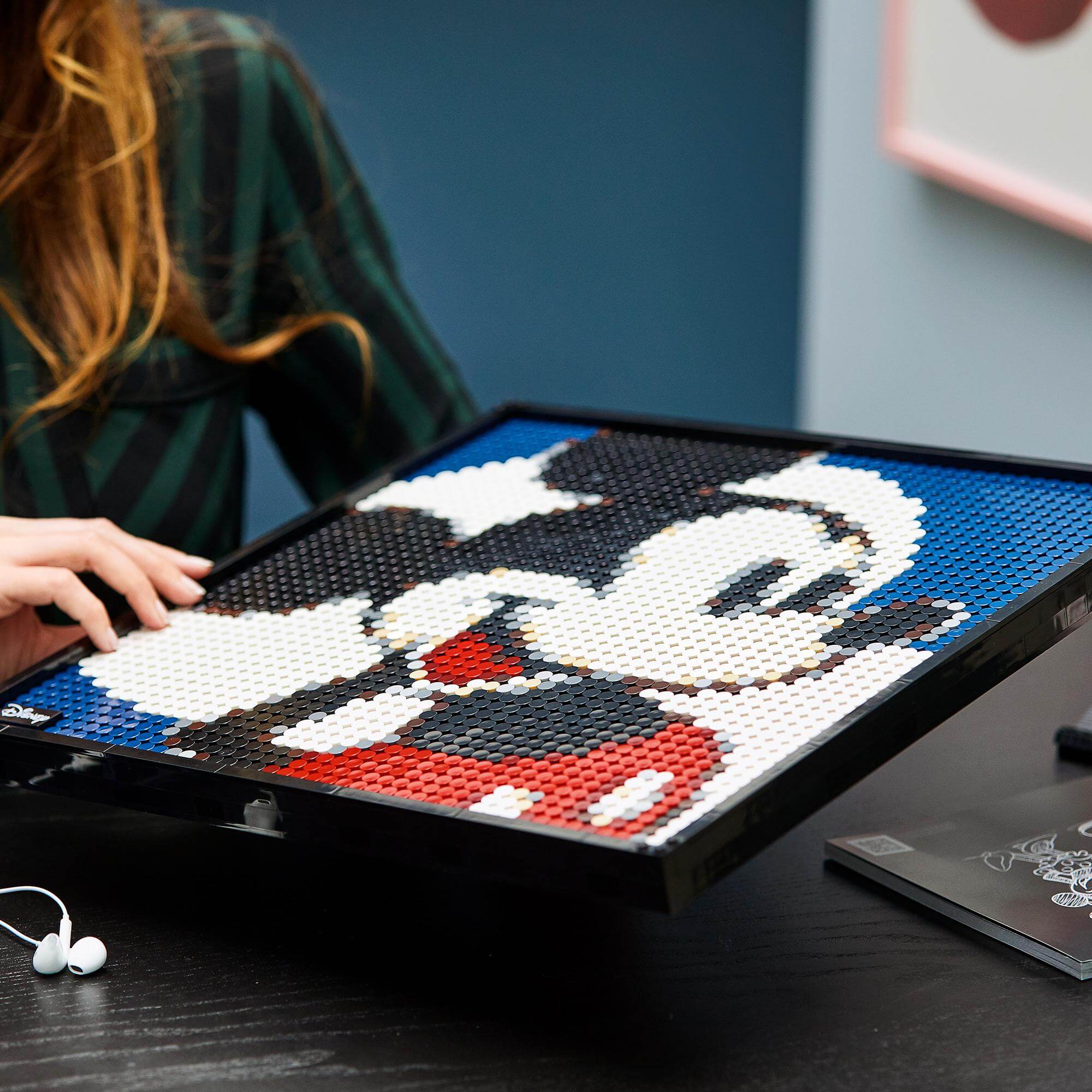 LEGO® Art Disney’s Mickey Mouse Poster Set 31202 in progress, showcasing a colorful mosaic of Mickey Mouse.