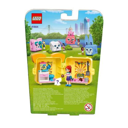 LEGO Friends Mia’s Pug Cube Playset 41664 packaging showcasing colorful toys and Mia figurine in a vibrant outdoor setting.