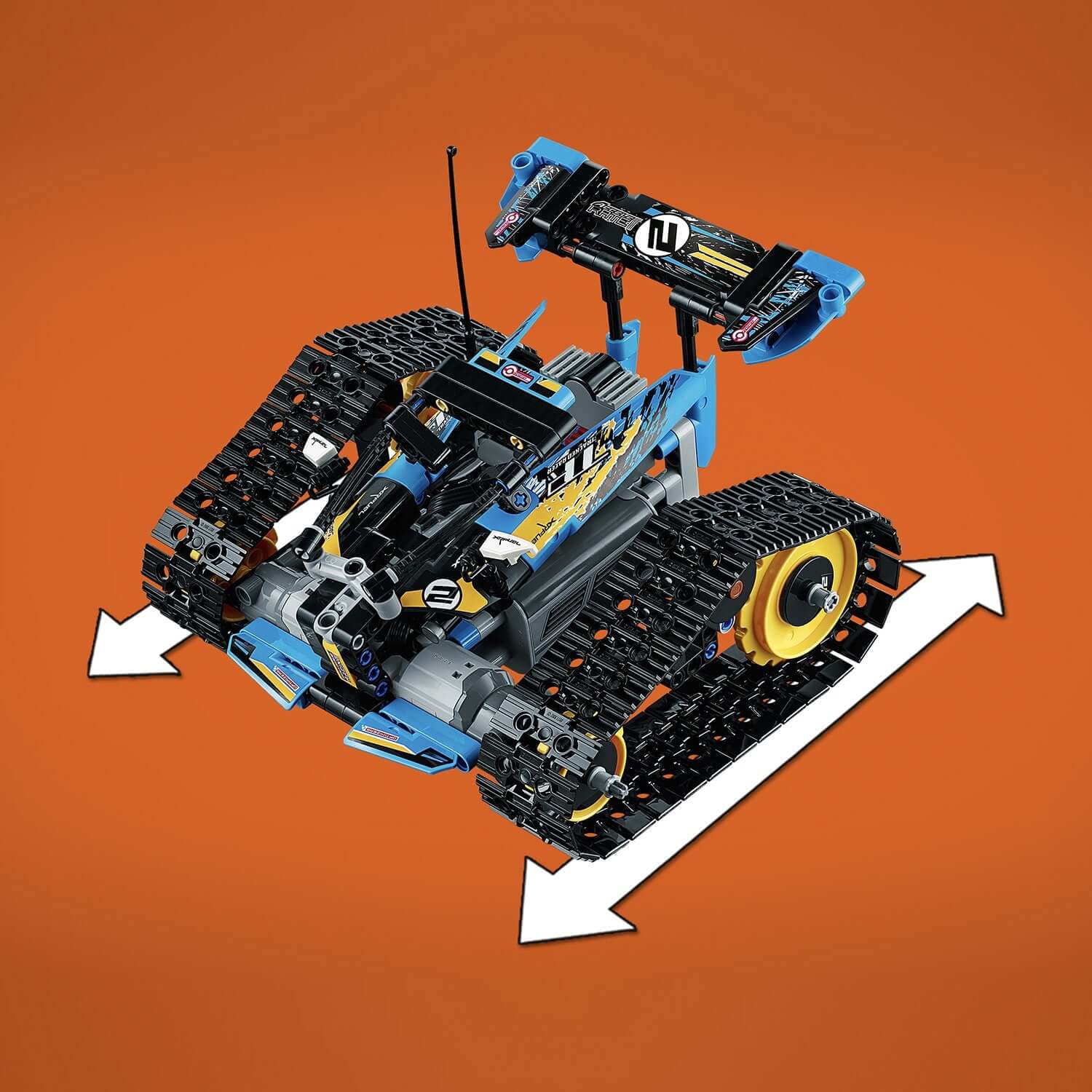 LEGO Technic Stunt Racer RC Car 42095 with tracks on an orange background, showcasing its racing design and features.