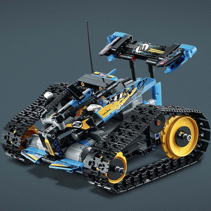 LEGO Technic Stunt Racer RC Car Toy 42095, featuring a blue and yellow remote-controlled vehicle with tracks.