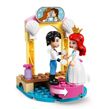 LEGO® Disney Ariel's Celebration Boat Toy set with minidoll figures of Ariel and Prince Eric in a playful scene.