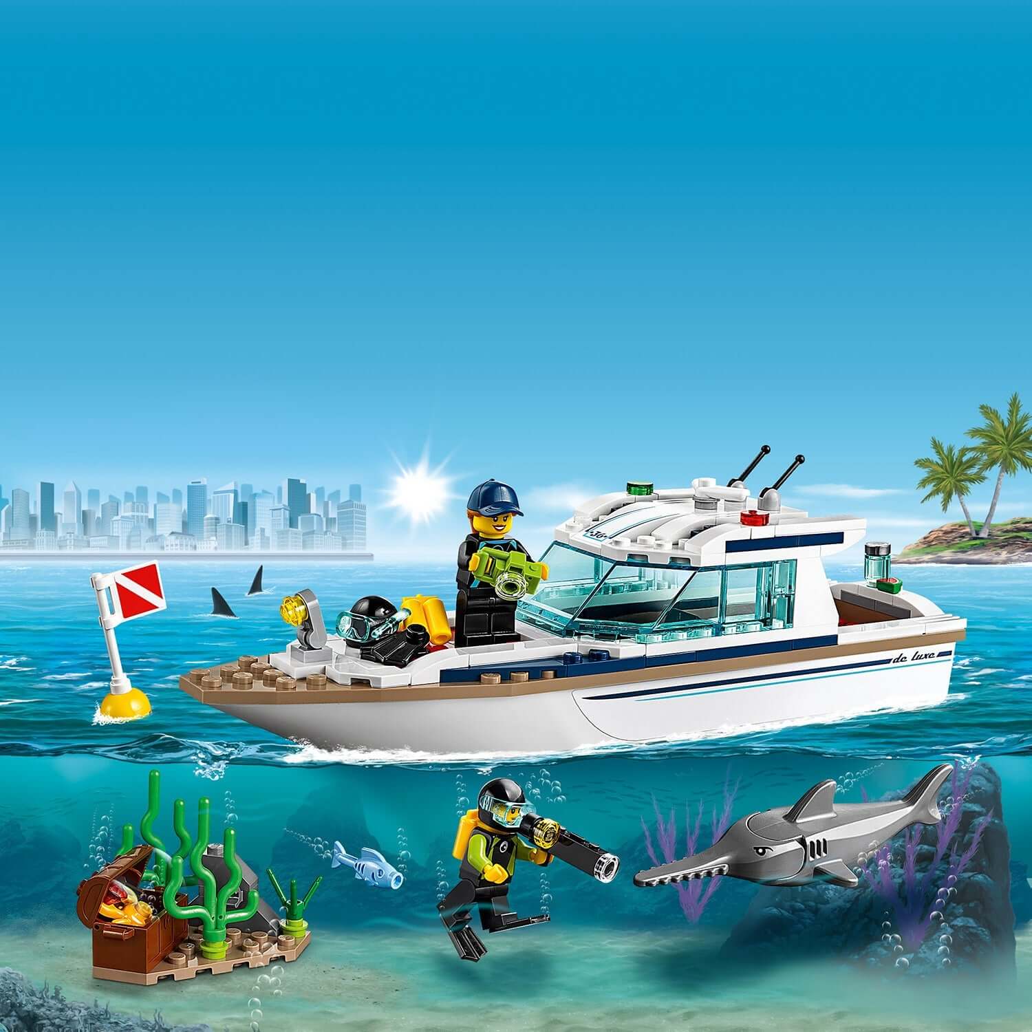 LEGO® City Diving Yacht Set 60221 with divers, a shark, and underwater scenery in clear blue waters.