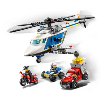 LEGO City Police Helicopter Chase Set 60243 with helicopter, police car, and getaway truck in action.