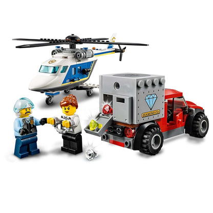 LEGO City Police Helicopter Chase Set 60243 with helicopter, truck, and mini-figures in action.
