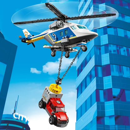 LEGO City Police Helicopter Chase Set 60243 with helicopter lifting getaway truck by powerful magnet.