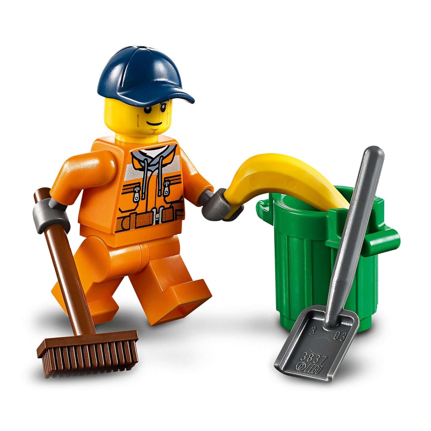 LEGO City street sweeper toy minifigure using a broom near a green trash can with a banana inside.