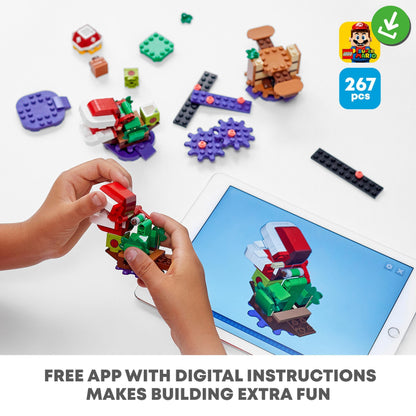 Child building LEGO® Super Mario Piranha Plant Expansion Set 71382 with digital instructions on a tablet.