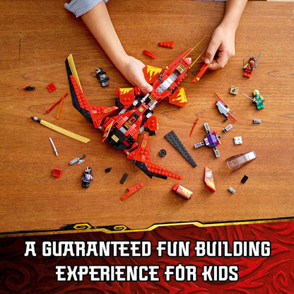 Kids building the LEGO NINJAGO Legacy Kai Fighter Toy Jet 71704, a fun and engaging activity.