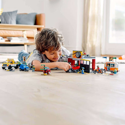 Child playing with LEGO® City Nitro Wheels Tuning Workshop set 60258, featuring vehicles and workshop scene.