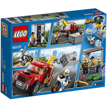 LEGO City police Tow Truck Trouble 60137 building toy set with police vehicles and minifigures.