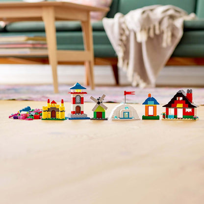 Colorful LEGO® Classic 4+ Bricks and Houses Set 11008 with various imaginative house designs on display.