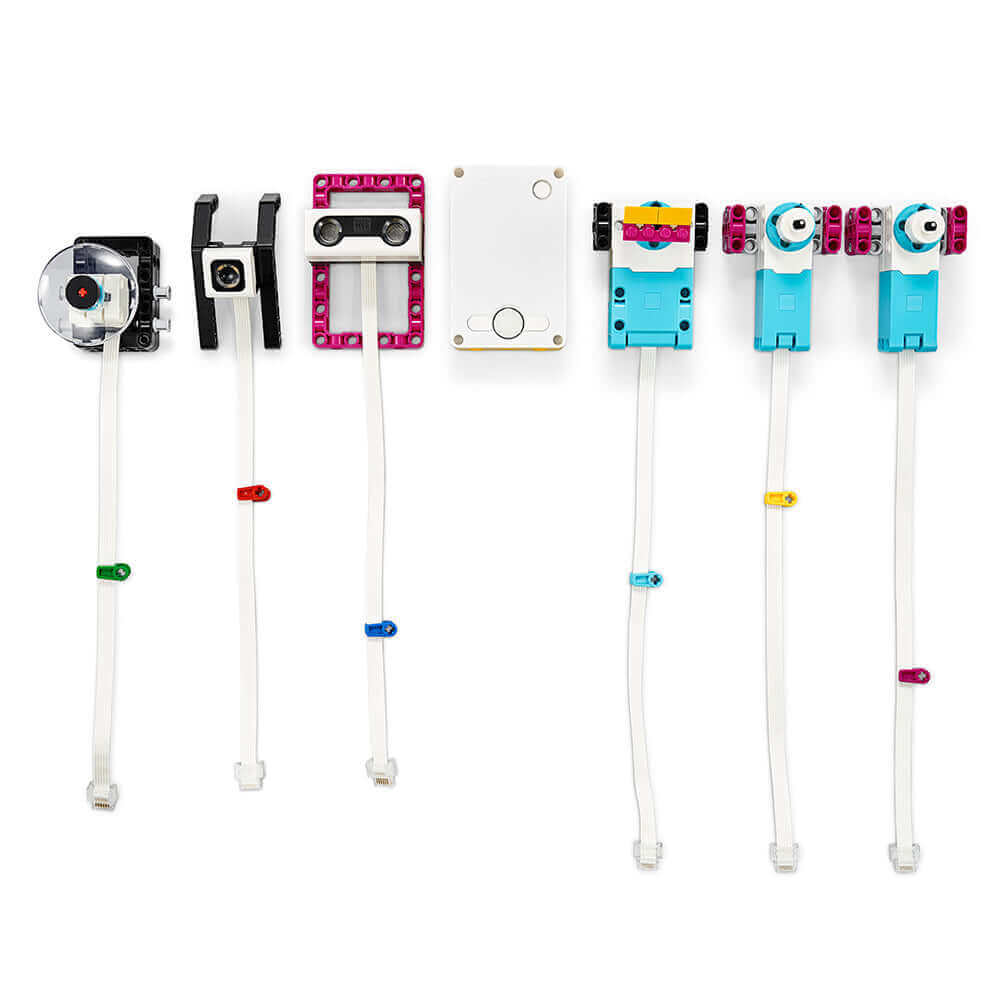 LEGO Education SPIKE PRIME set components including sensors, motors, and programmable hub for STEAM learning.