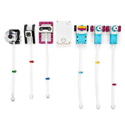 LEGO Education SPIKE PRIME set components including sensors, motors, and programmable hub for STEAM learning.