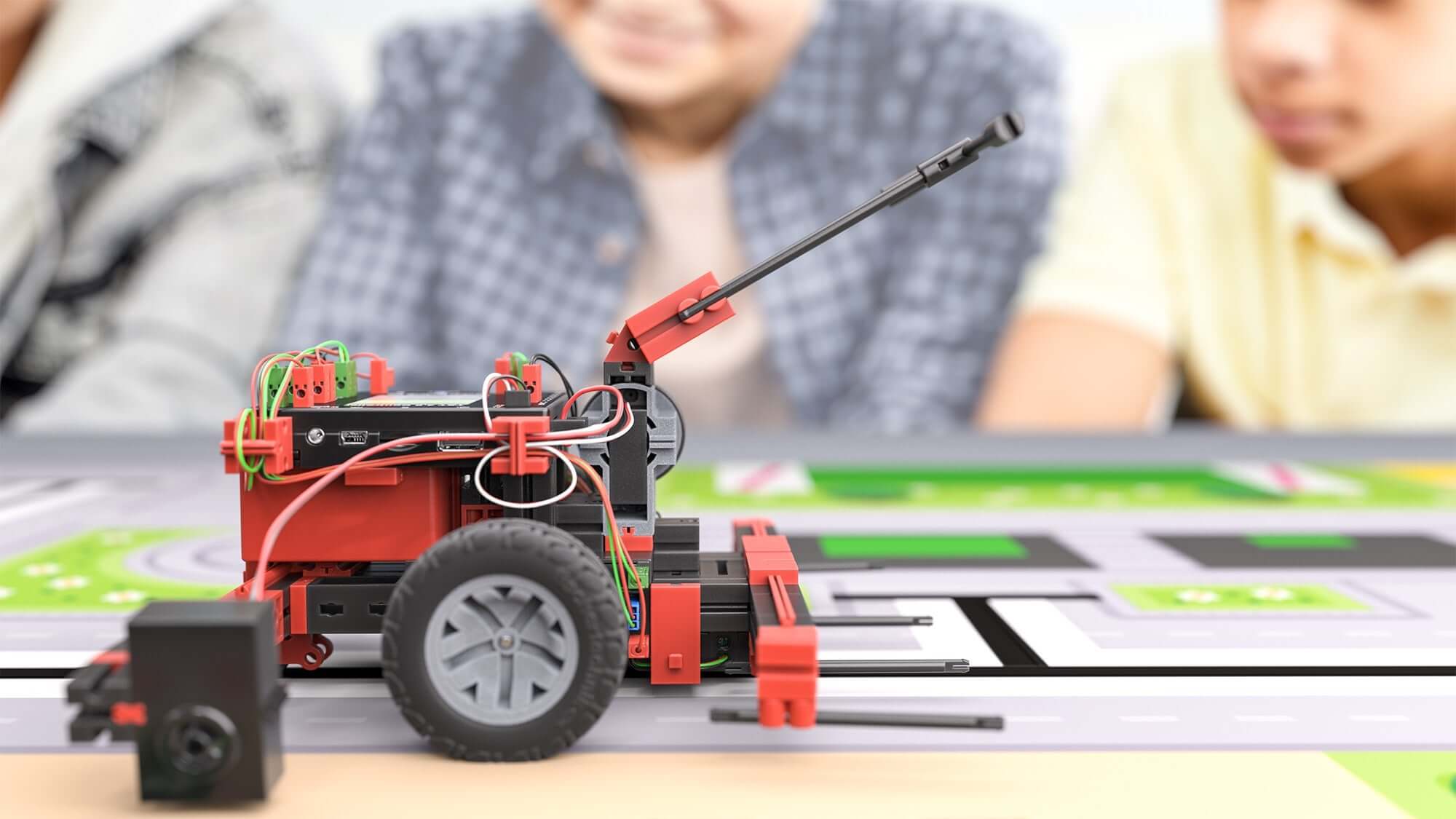 STEM Coding RoboMission robotics construction kit displayed during World Robot Olympiad activity.