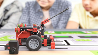 STEM Coding RoboMission robotics construction kit displayed during World Robot Olympiad activity.