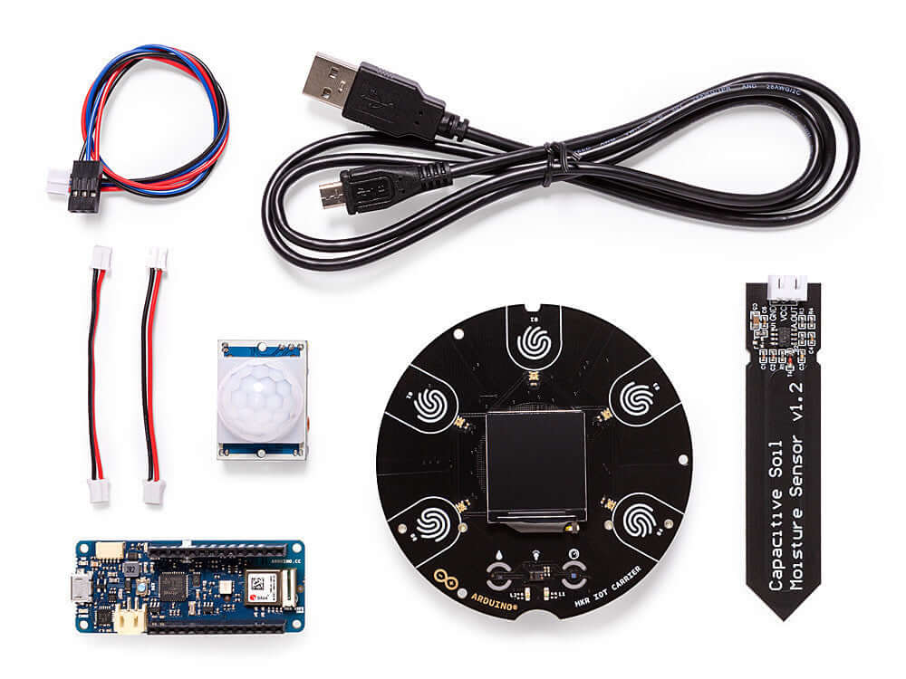 Components of Arduino Education Explore IoT Kit with sensors and cables for building connected devices.