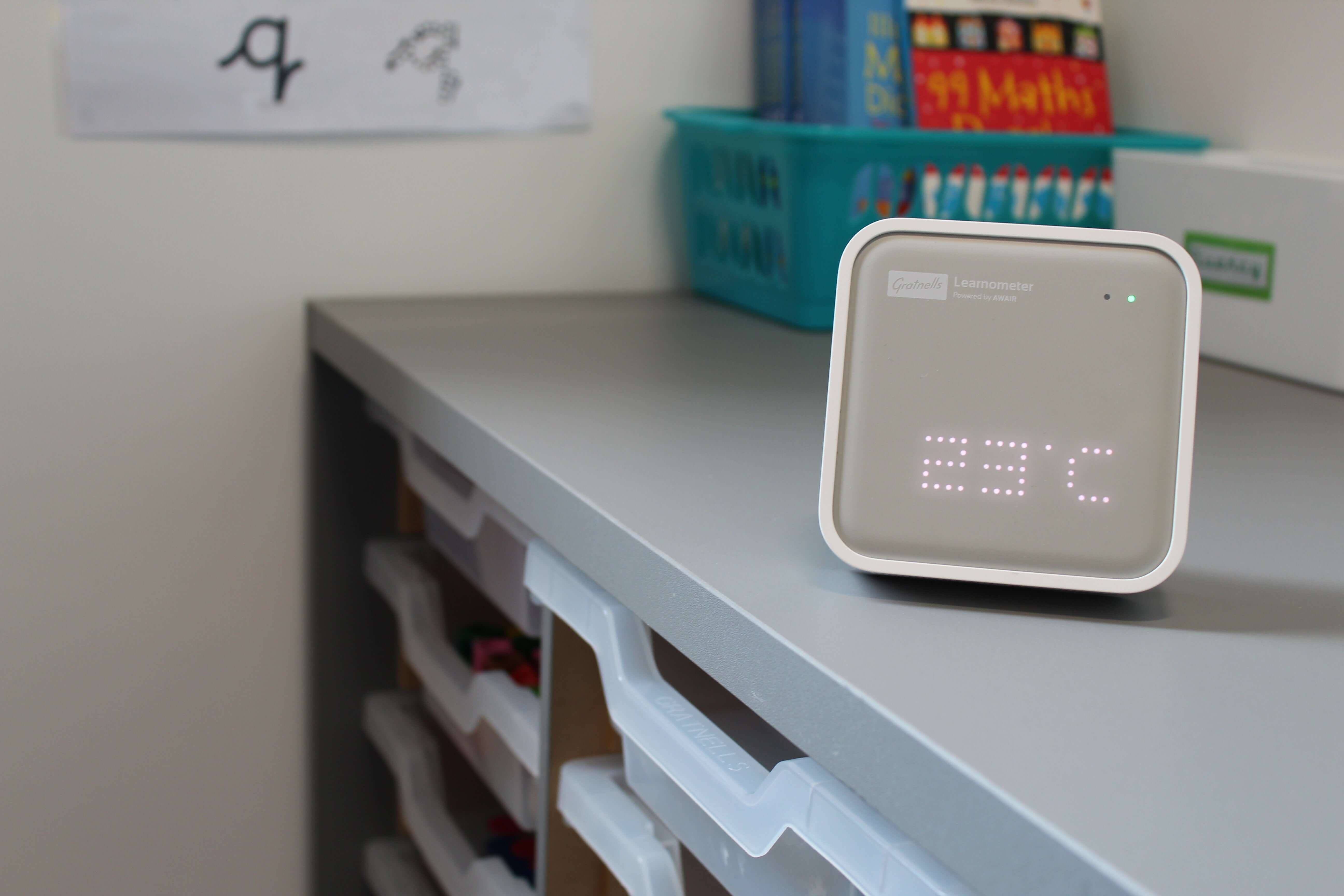 Gratnells Learnometer displayed on a classroom desk, showing temperature for optimal teaching conditions.