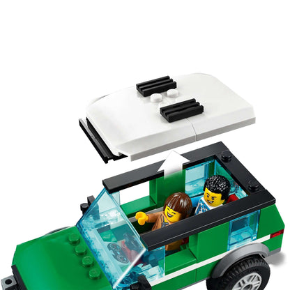 LEGO City Race Buggy Transporter featuring an off-roader SUV with removable roof and driver minifigures.
