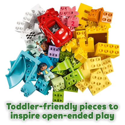 Colorful LEGO® DUPLO pieces including a red car, perfect for inspiring toddlers' open-ended play.