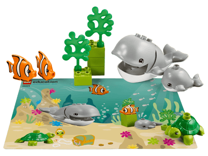 LEGO® Education Animals 45029 set featuring colorful marine life including whales, turtle, and clownfish on a vibrant play mat.