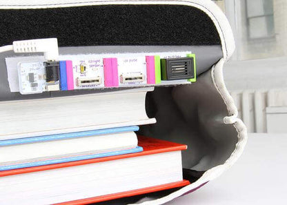 littleBits STEAM Student Set electronics kit with books, showcasing easy integration in student learning.