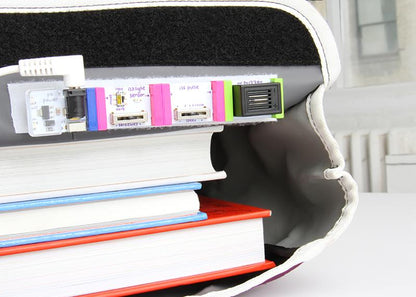 LittleBits STEAM Student Set showing electronics modules integrated with books for hands-on learning in engineering.
