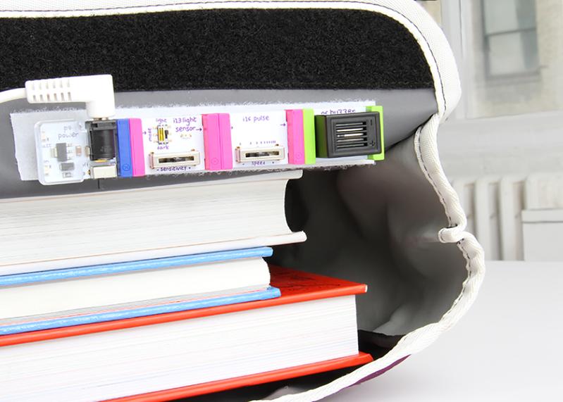 LittleBits STEAM Student Set showing electronics modules integrated with books for hands-on learning in engineering.