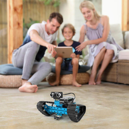 Family engaging with the Makeblock mBot Ranger robot kit on a living room floor, showcasing its interactive features.