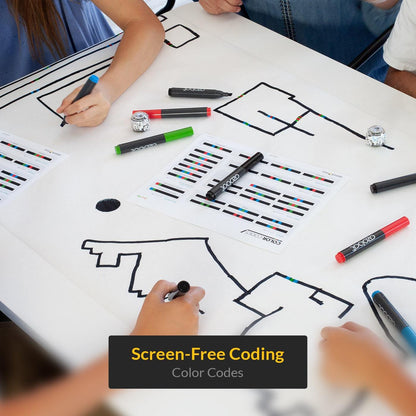 Students engaging in screen-free coding with color codes for Ozobot Evo interactive activities.