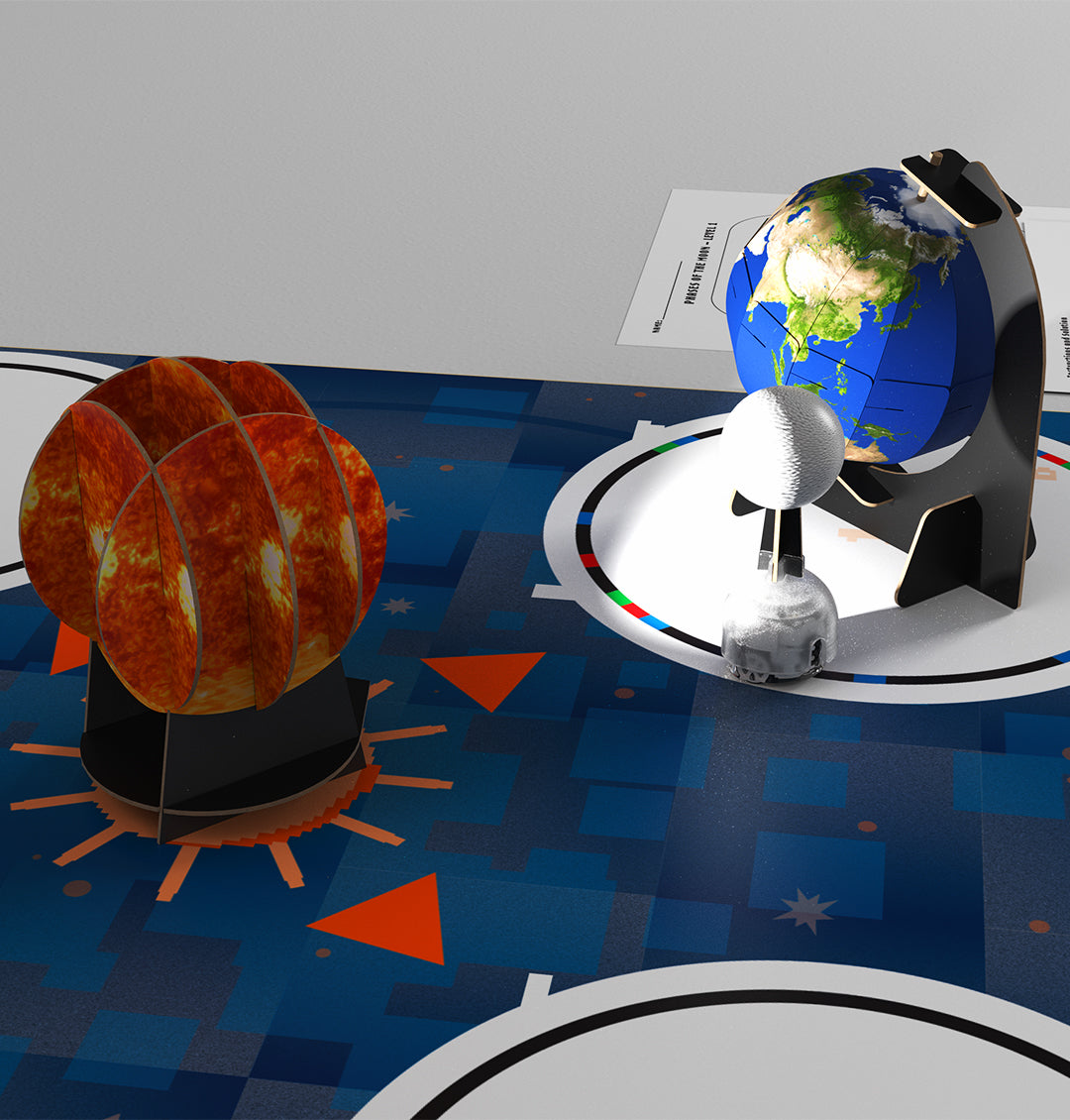 OzoGoes to the Solar System kit featuring sun, earth globe, and interactive activity mat for STEAM learning.