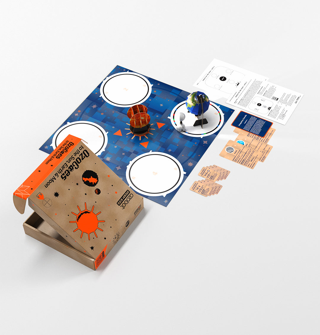 OzoGoes to the Sun, Earth & Moon kit with educational materials for STEAM learning and solar system exploration.