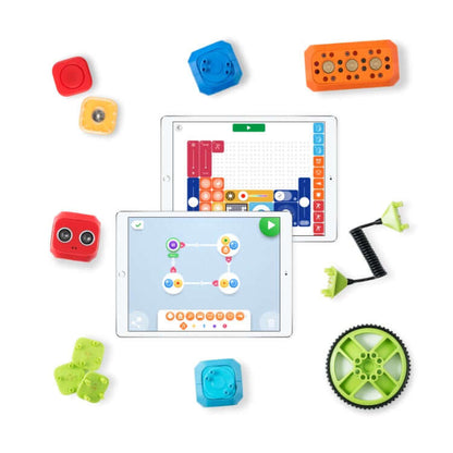 Robo Wunderkind Education Extension Kit components with tablet featuring programming interface and colorful building blocks.