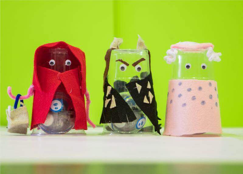 Crafted characters made from plastic cups, felt, and googly eyes, showcasing creativity with the Sphero Craft Pack.