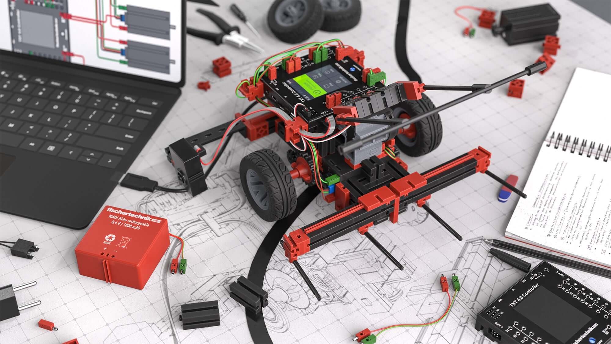 STEM Coding RoboMission robotics construction kit with components on a workspace, designed for World Robot Olympiad.